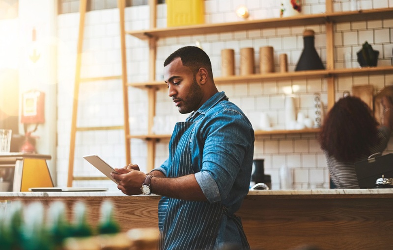 small business owners arranging their shop