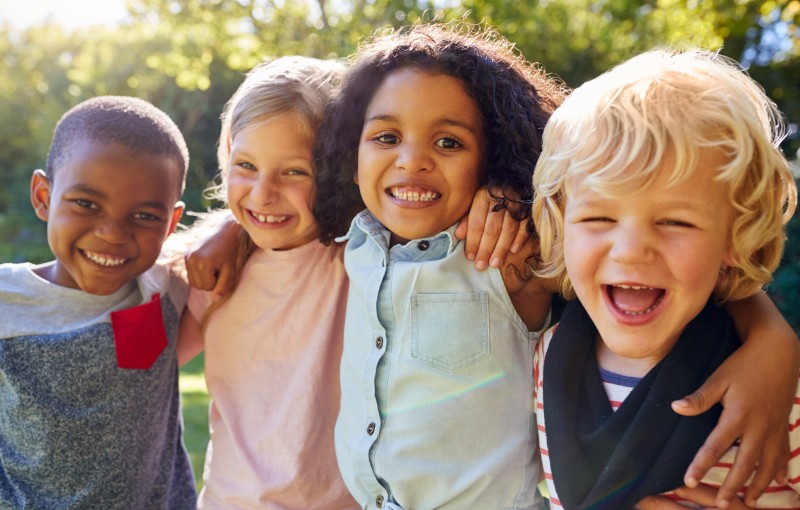 a group of children smiling