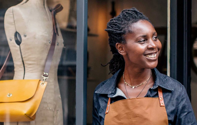  a woman smiling looking to the side