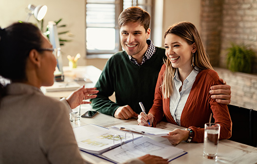 Young couple getting an SBA loan