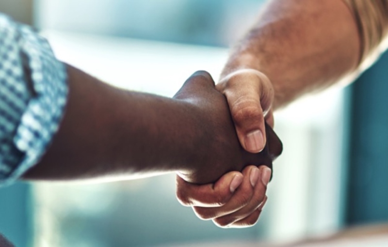 two people shaking hands