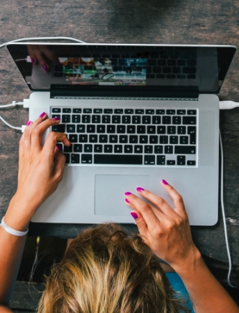 a person working on their laptop computer